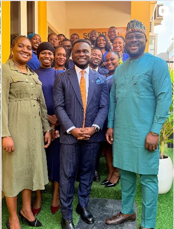 Oluwole with the Seven30 family